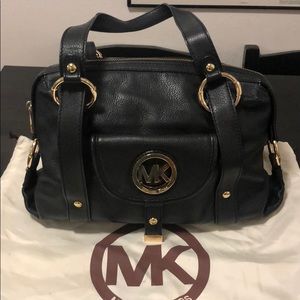 Michael Kors purse, wallet, and storage bag